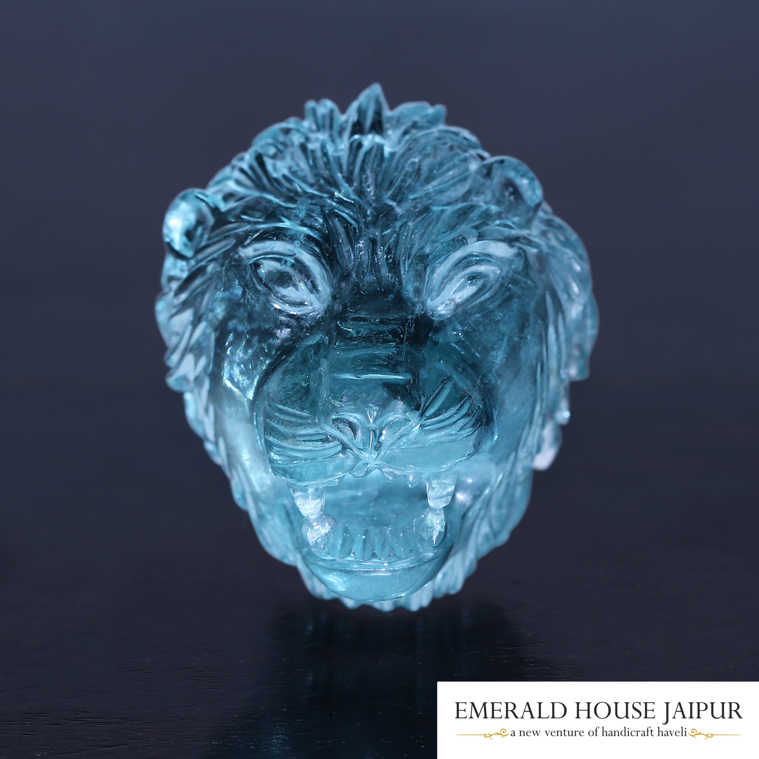 Carved Aquamarine Lion - Emerald House Jaipur