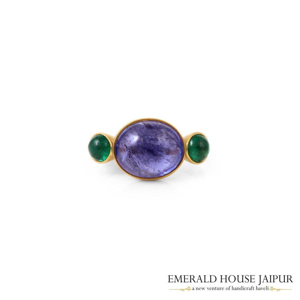 Tanzanian Oval Cabochon Tanzanite Ring With Round Emerald Cabochon In 18K Matte Yellow Gold