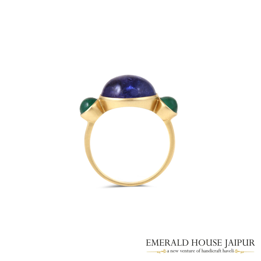 Tanzanian Oval Cabochon Tanzanite Ring With Round Emerald Cabochon In 18K Matte Yellow Gold