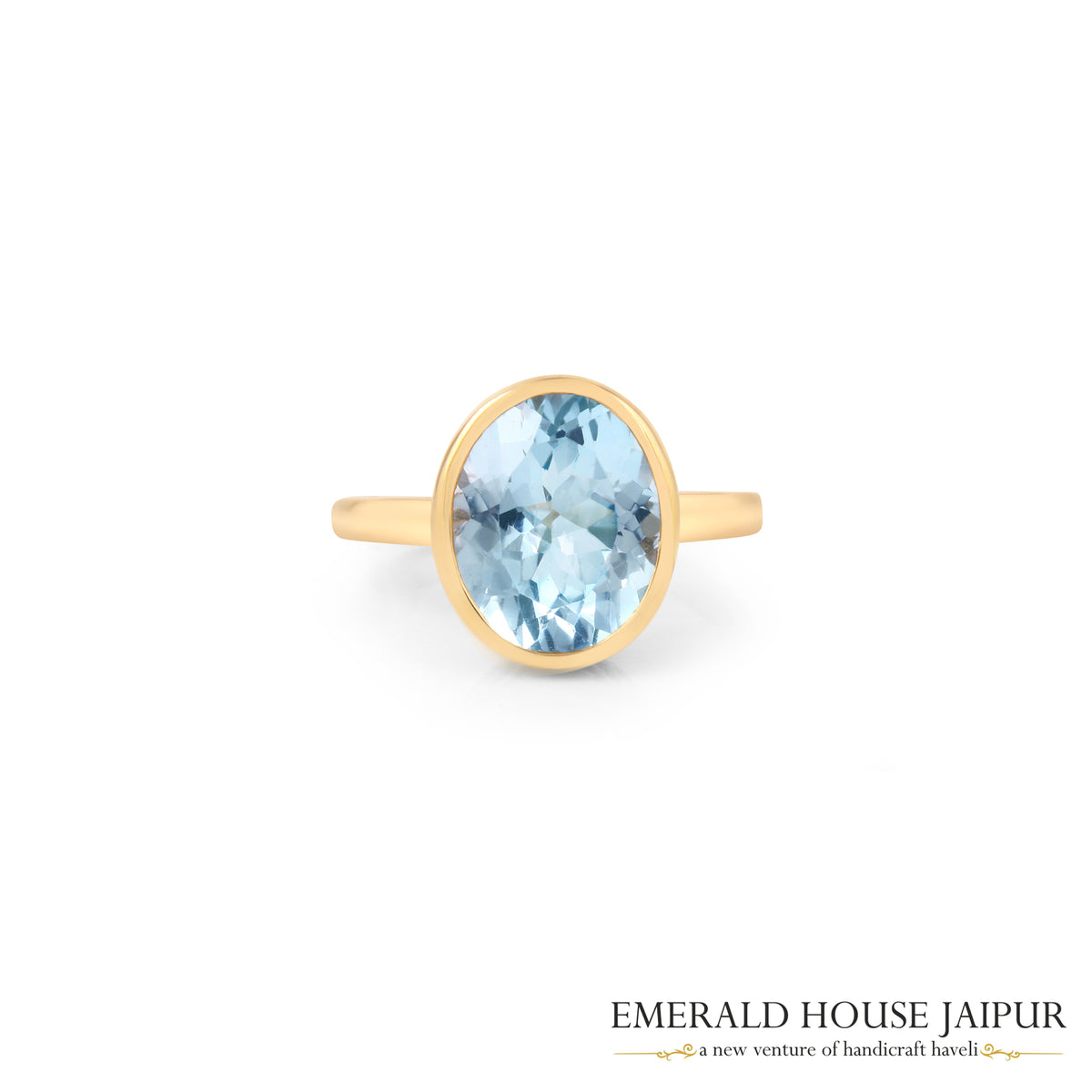 Brazilian Oval Blue Topaz Ring In 14K Yellow Gold