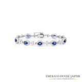 Oval Blue Sapphire with Round and Baguette Diamond Bracelet